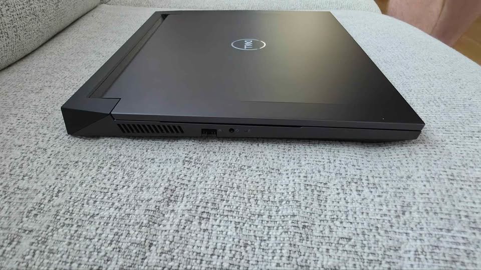 Dell G15 Gaming Laptop with Core i5 and RTX GPU — left side view showing USB-A port, audio jack, and ventilation grille