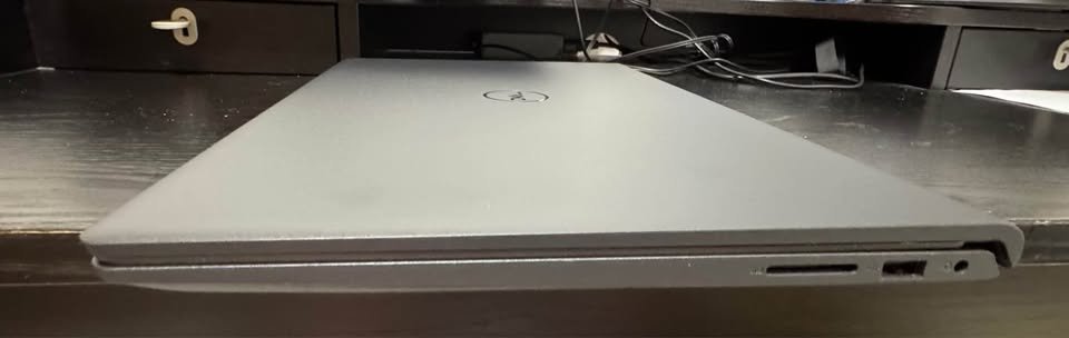 Dell Inspiron 15 Core i7-1355U Laptop Left Side Profile View Showing SD Card Slot USB Type-A Port and 3.5mm Audio Jack in Silver Aluminum Finish
