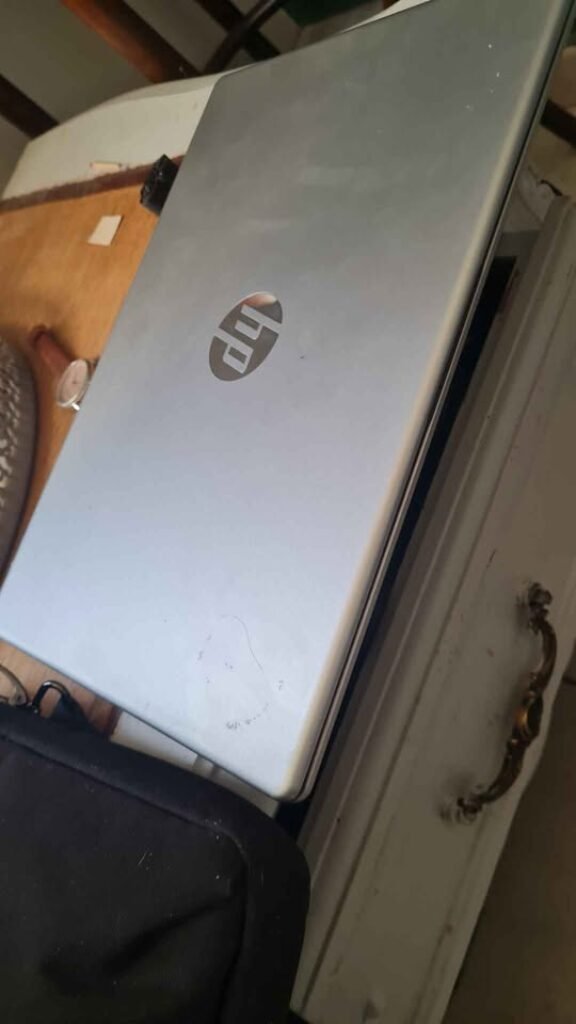 HP 14 inch Core i7 Laptop silver lid close view showcasing slim lightweight body construction and premium build quality