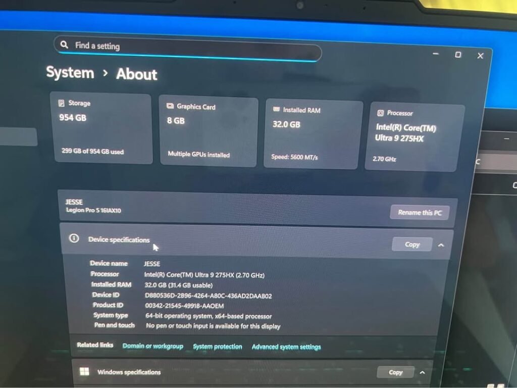 Windows 11 System About page showing Intel Core Ultra 9 275HX processor running at 2.70 GHz with 32 GB DDR5 RAM at 5600 MT/s speed, 8 GB multiple GPUs, and 954 GB storage on a Lenovo Legion Pro 5 16IAX10 laptop — highlighting real-world CPU specs and performance statistics.