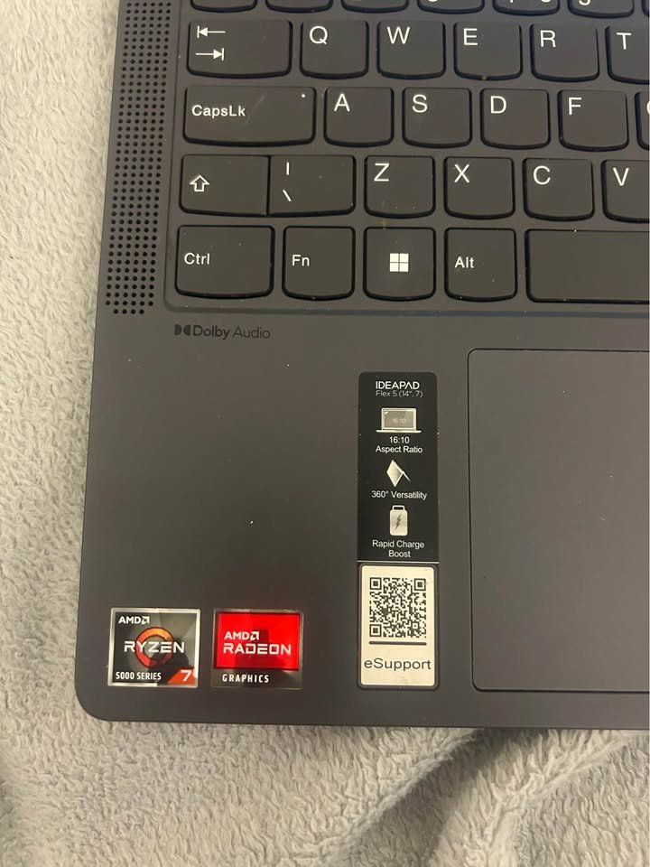 Lenovo IdeaPad Flex 5 14-inch 2-in-1 laptop featuring AMD Ryzen 7 5000 Series processor, AMD Radeon Graphics, Dolby Audio speaker grille and backlit keyboard layout